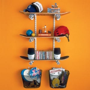 Skateboard shelving  three skate boards mounted to wall as shelves