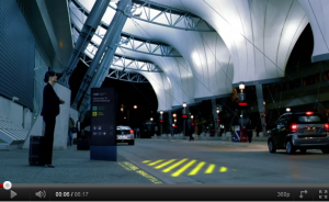 In the future woman standing at airport pickup station