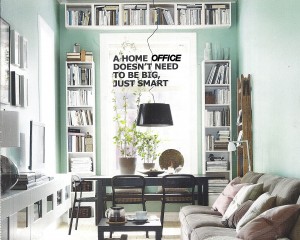 home office book shelves above a window