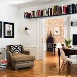 Book shelves over doorway in home office