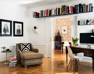 Book shelves over doorway in home office